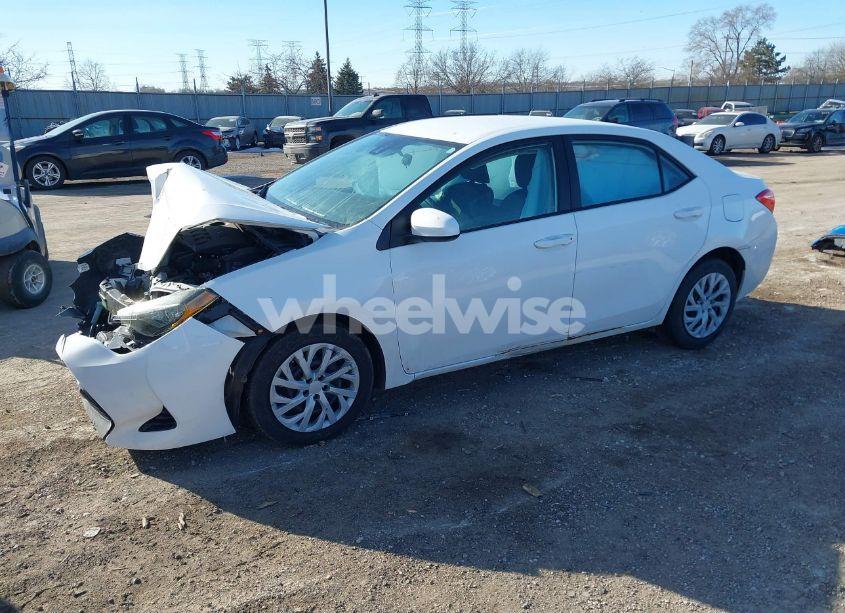 Photo 2 of 2017 Toyota Corolla LE (VIN 5YFBURHE8HP673752)