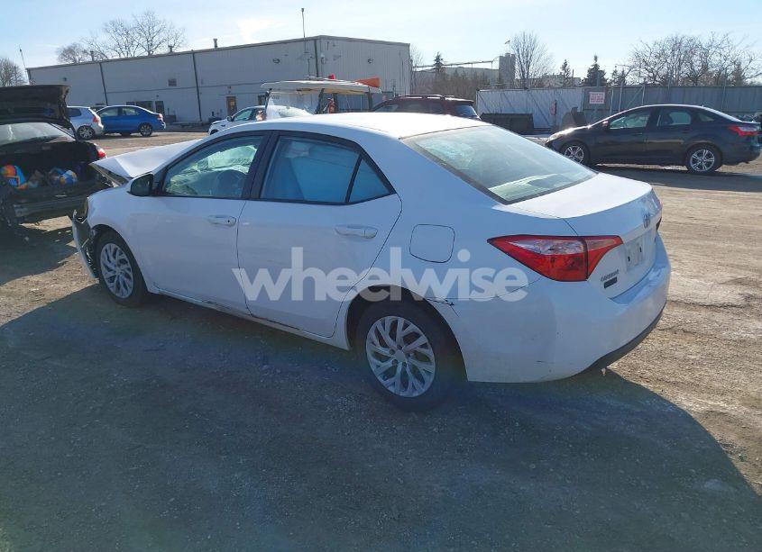 Photo 3 of 2017 Toyota Corolla LE (VIN 5YFBURHE8HP673752)