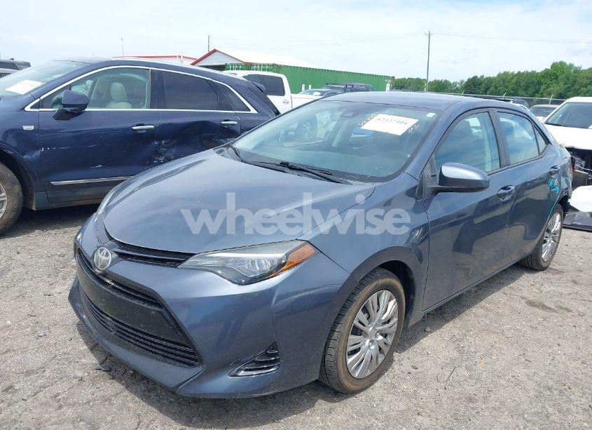 Photo 2 of 2017 Toyota Corolla L/LE/SE/SE SPECIAL EDITION/XLE/XSE (VIN 5YFBURHE8HP677302)