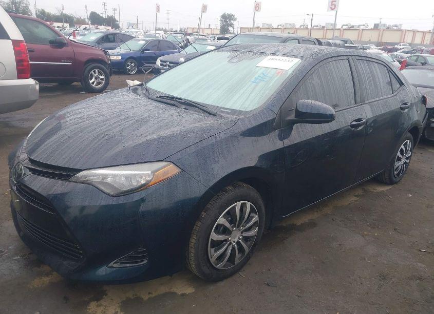 Photo 2 of 2018 Toyota Corolla LE (VIN 5YFBURHE8JP795999)