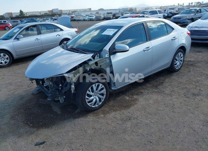 Photo 2 of 2018 Toyota Corolla LE (VIN 5YFBURHE8JP827589)