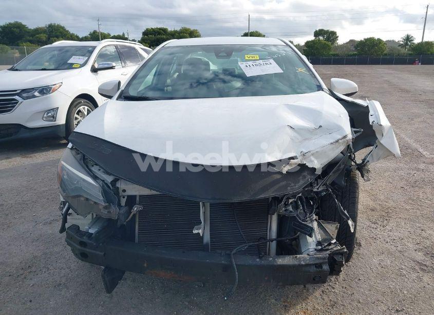 Photo 6 of 2019 Toyota Corolla LE (VIN 5YFBURHE8KP911297)