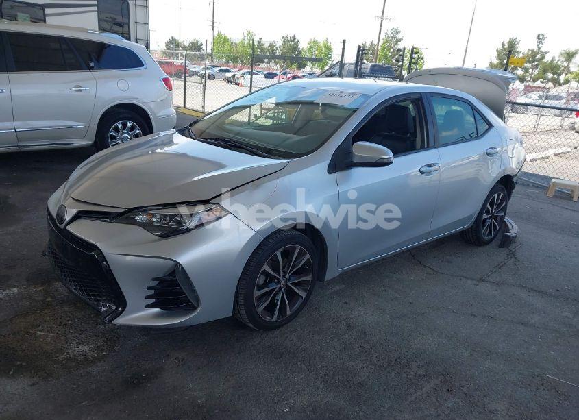 Photo 2 of 2017 Toyota Corolla SE (VIN 5YFBURHE9HP574728)