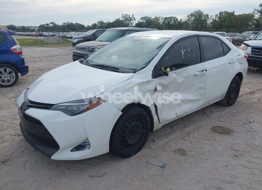 Photo 2 of 2017 Toyota Corolla LE (VIN 5YFBURHE9HP597300)