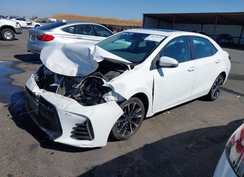 Photo 2 of 2017 Toyota Corolla SE (VIN 5YFBURHE9HP627721)