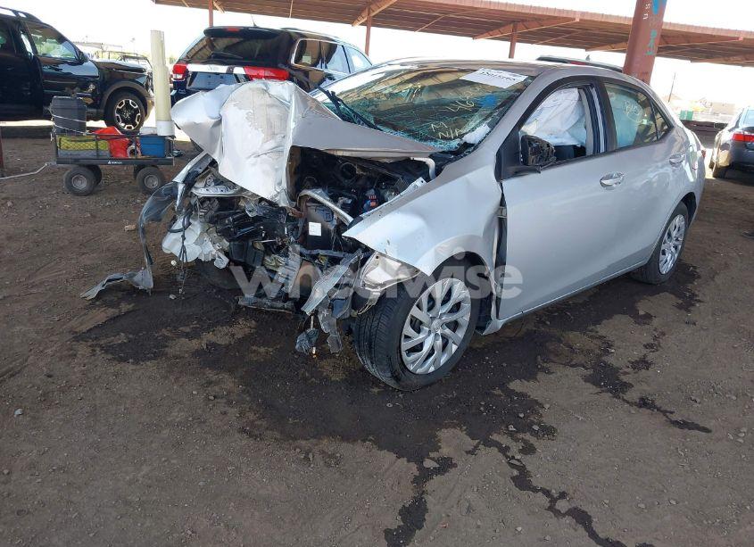 Photo 2 of 2017 Toyota Corolla LE (VIN 5YFBURHE9HP628643)