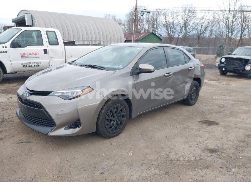 Photo 2 of 2017 Toyota Corolla LE (VIN 5YFBURHE9HP636578)