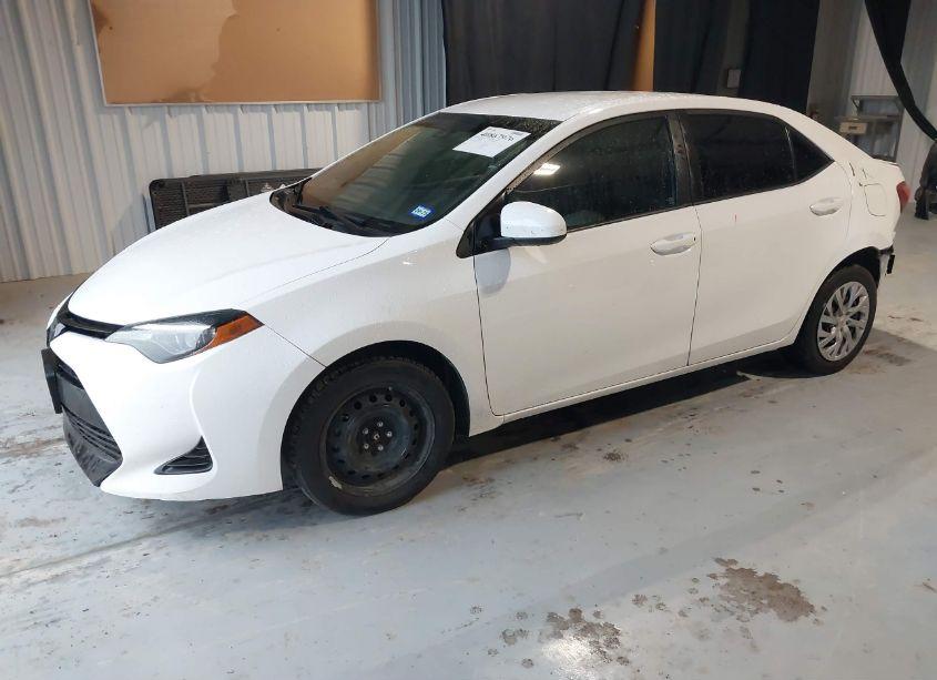 Photo 2 of 2017 Toyota Corolla LE (VIN 5YFBURHE9HP672402)