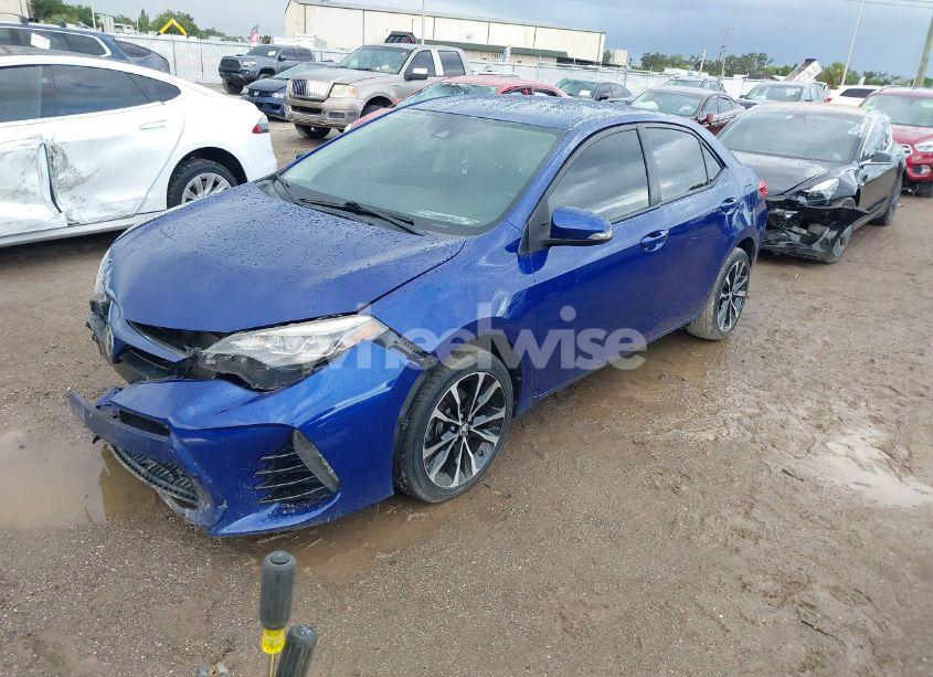 Photo 2 of 2017 Toyota Corolla SE (VIN 5YFBURHE9HP677065)