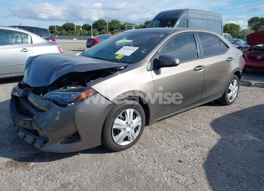 Photo 2 of 2017 Toyota Corolla LE (VIN 5YFBURHE9HP689524)