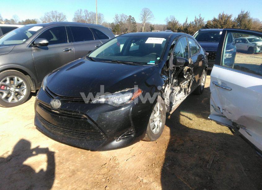 Photo 2 of 2017 Toyota Corolla L (VIN 5YFBURHE9HP716558)