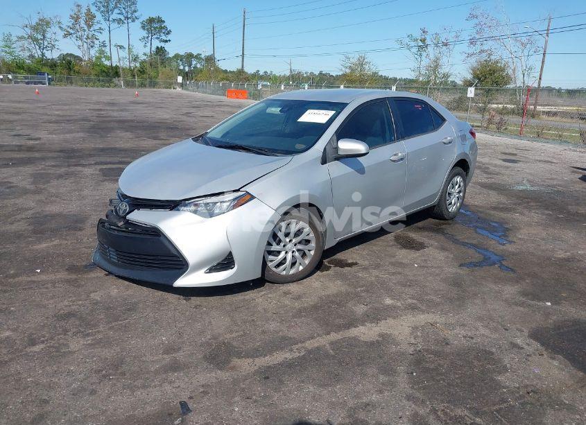 Photo 2 of 2017 Toyota Corolla LE (VIN 5YFBURHE9HP726250)