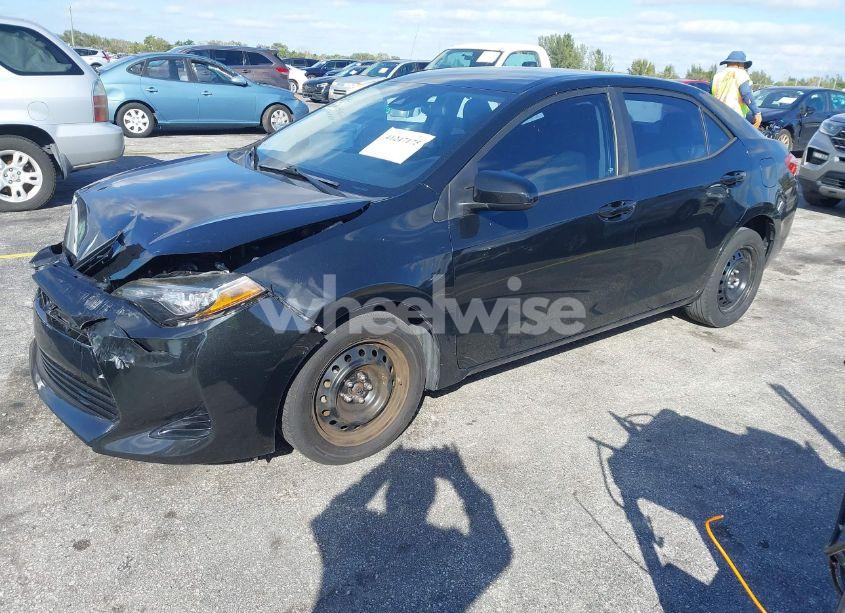 Photo 2 of 2017 Toyota Corolla LE (VIN 5YFBURHE9HP731402)