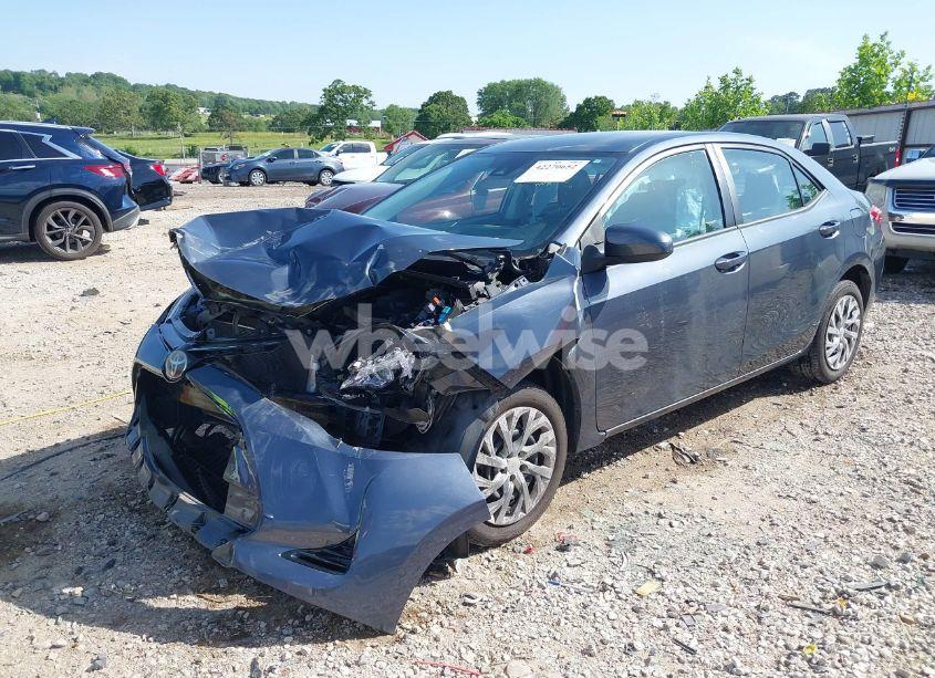 Photo 2 of 2017 Toyota Corolla LE (VIN 5YFBURHE9HP733733)