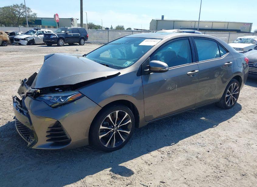 Photo 2 of 2018 Toyota Corolla XSE (VIN 5YFBURHE9JP762882)