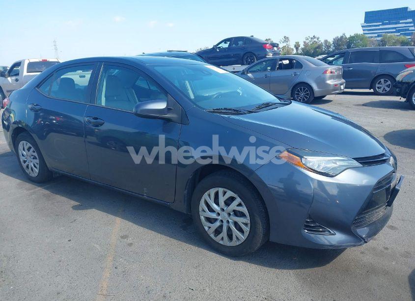 2017 Toyota Corolla LE (VIN 5YFBURHEXHP571448) main photo