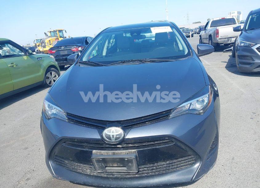 Photo 12 of 2017 Toyota Corolla LE (VIN 5YFBURHEXHP571448)