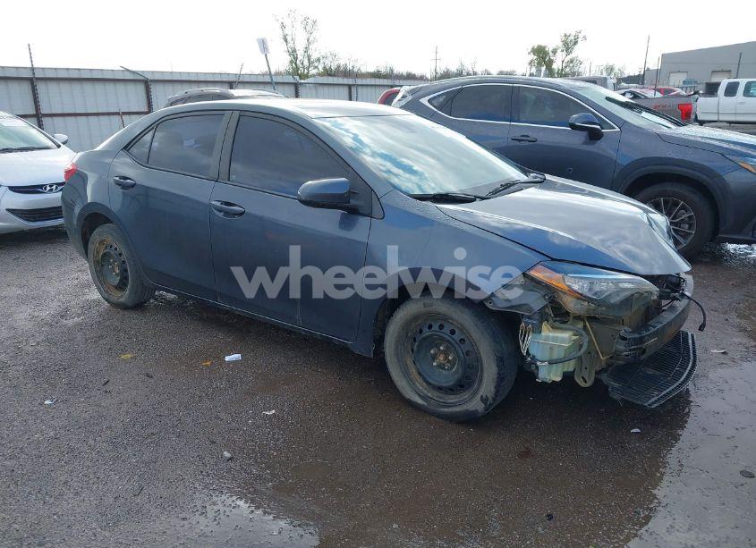 2017 Toyota Corolla LE (VIN 5YFBURHEXHP574107) main photo