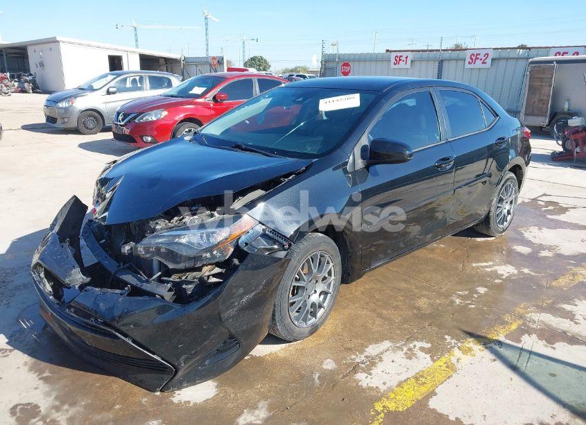 Photo 2 of 2017 Toyota Corolla LE (VIN 5YFBURHEXHP610734)