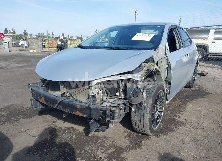 Photo 2 of 2017 Toyota Corolla LE (VIN 5YFBURHEXHP645015)