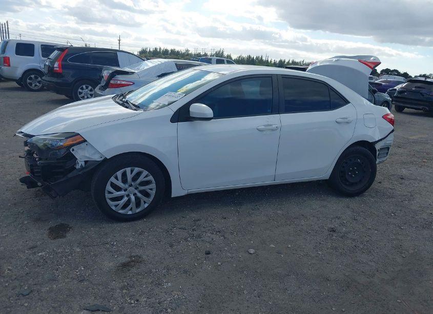 Photo 2 of 2017 Toyota Corolla LE (VIN 5YFBURHEXHP654247)