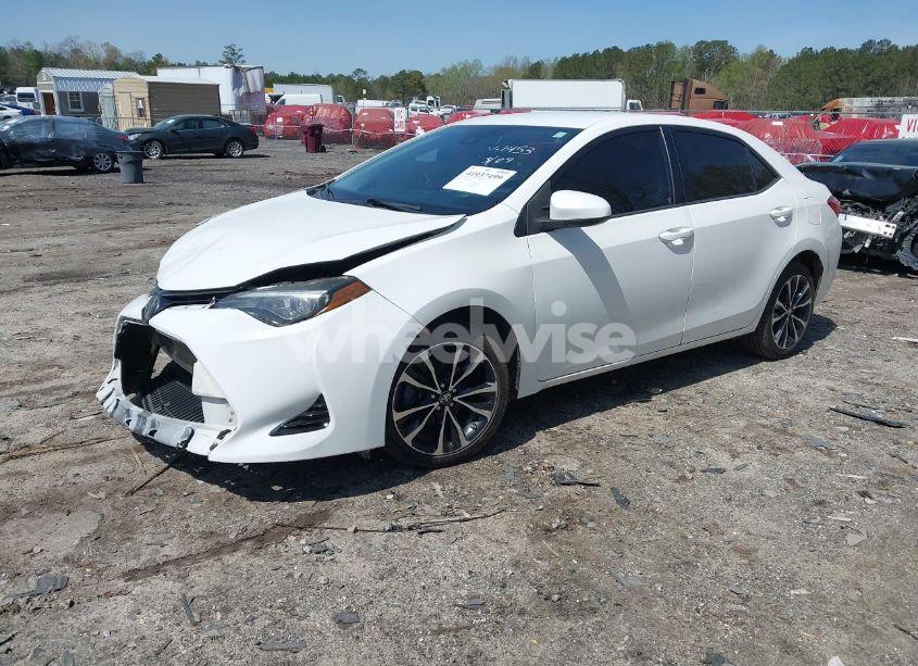 Photo 2 of 2017 Toyota Corolla LE (VIN 5YFBURHEXHP671453)