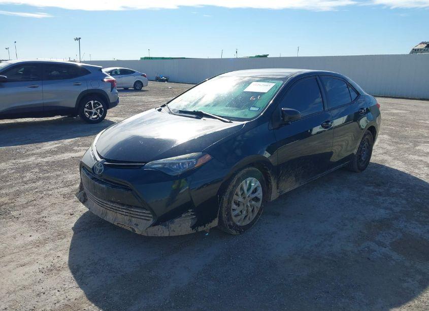 Photo 2 of 2017 Toyota Corolla LE (VIN 5YFBURHEXHP692075)