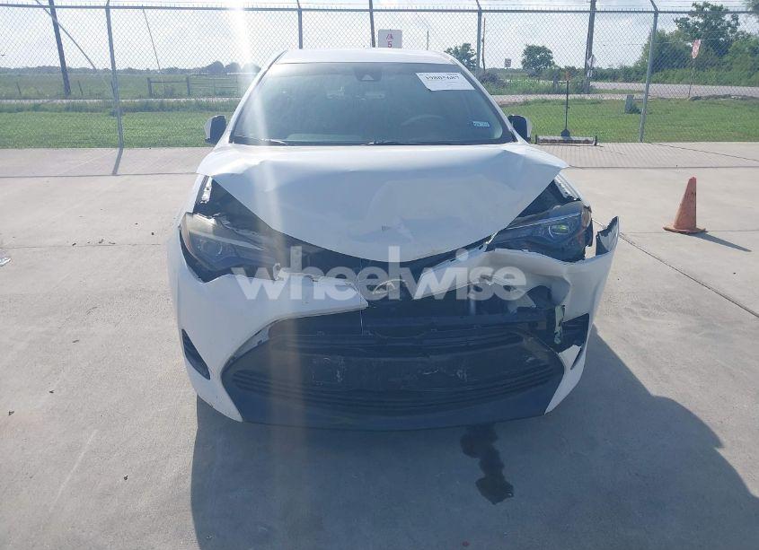 Photo 12 of 2017 Toyota Corolla LE (VIN 5YFBURHEXHP693355)