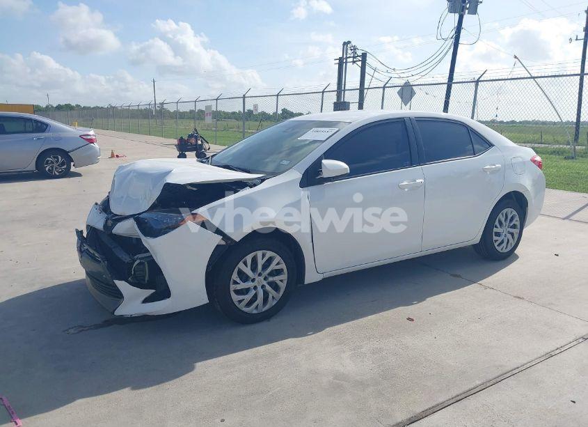 Photo 2 of 2017 Toyota Corolla LE (VIN 5YFBURHEXHP693355)