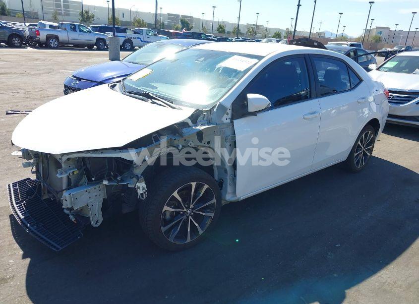 Photo 2 of 2017 Toyota Corolla SE (VIN 5YFBURHEXHP699317)