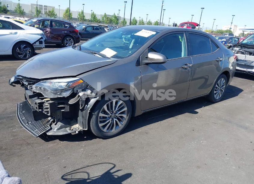 Photo 2 of 2018 Toyota Corolla XLE (VIN 5YFBURHEXJP788200)