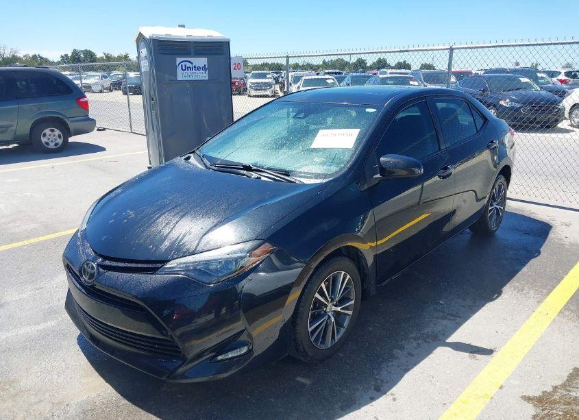 Photo 2 of 2018 Toyota Corolla LE (VIN 5YFBURHEXJP827769)