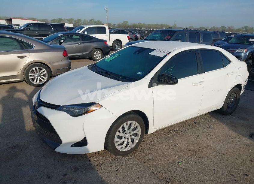 Photo 2 of 2019 Toyota Corolla LE (VIN 5YFBURHEXKP877203)