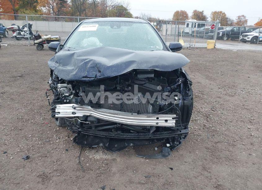 Photo 6 of 2022 Toyota Corolla LE (VIN 5YFEPMAE2NP326544)