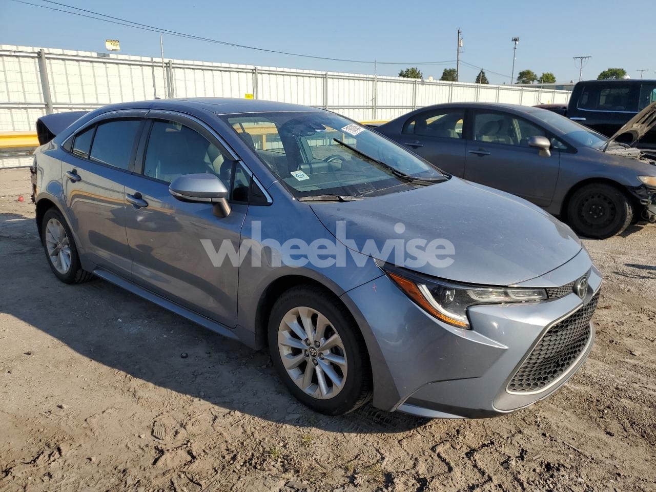 Photo 4 of 2021 TOYOTA COROLLA XLE (VIN 5YFFPMAE5MP227395)