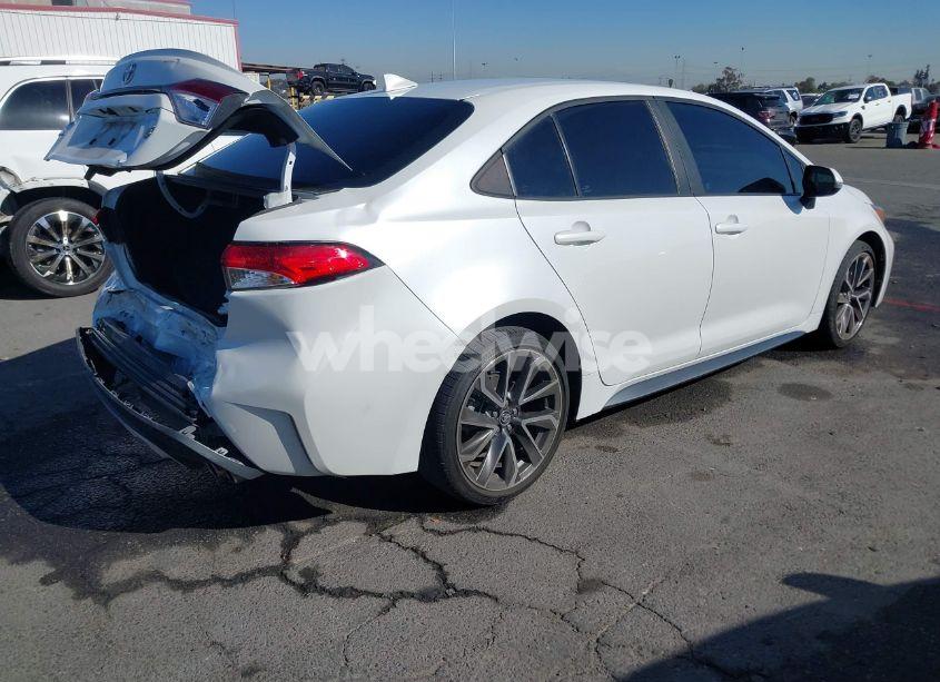 Photo 4 of 2022 Toyota Corolla SE (VIN 5YFS4MCE1NP113075)