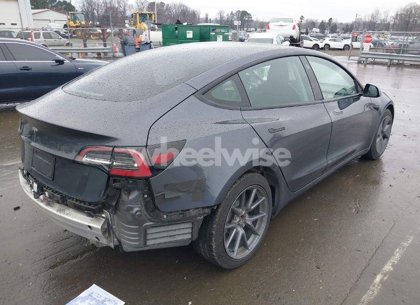 Photo 4 of 2021 Tesla Model 3 STANDARD RANGE PLUS REAR-WHEEL DRIVE (VIN 5YJ3E1EA0MF016938)