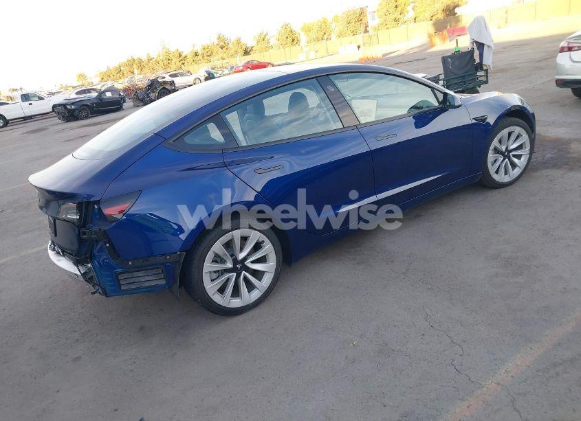 Photo 4 of 2021 Tesla Model 3 STANDARD RANGE PLUS REAR-WHEEL DRIVE (VIN 5YJ3E1EA0MF073883)