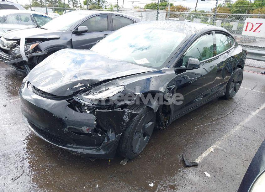 Photo 2 of 2021 Tesla Model 3 STANDARD RANGE PLUS REAR-WHEEL DRIVE (VIN 5YJ3E1EA0MF083846)