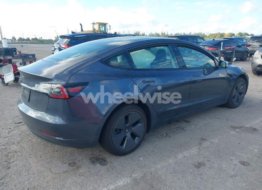 Photo 4 of 2022 Tesla Model 3 REAR-WHEEL DRIVE (VIN 5YJ3E1EA1NF338196)