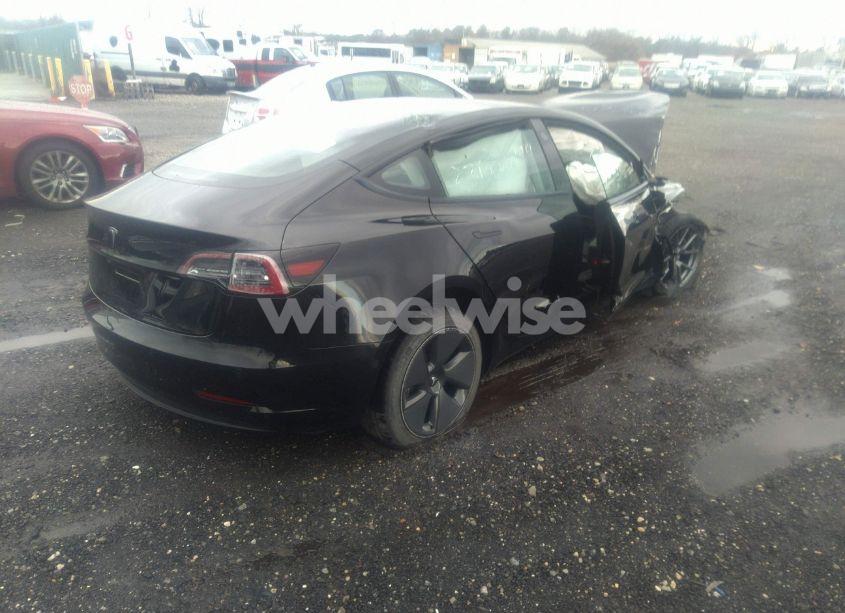 Photo 4 of 2021 Tesla Model 3 STANDARD RANGE PLUS REAR-WHEEL DRIVE (VIN 5YJ3E1EA2MF031151)