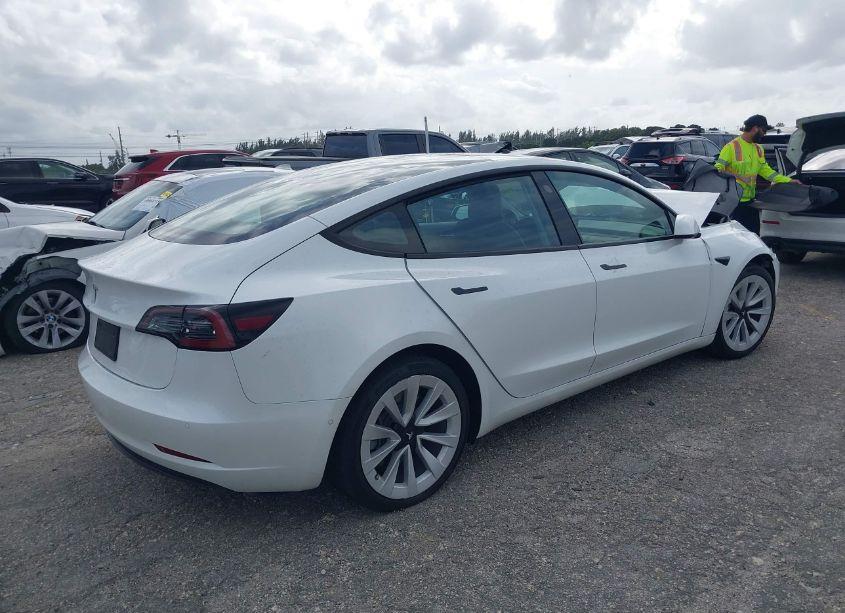 Photo 4 of 2021 Tesla Model 3 STANDARD RANGE PLUS REAR-WHEEL DRIVE (VIN 5YJ3E1EA2MF990842)