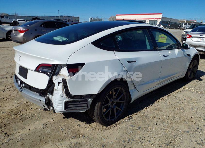 Photo 4 of 2021 Tesla Model 3 STANDARD RANGE PLUS REAR-WHEEL DRIVE (VIN 5YJ3E1EA3MF088667)