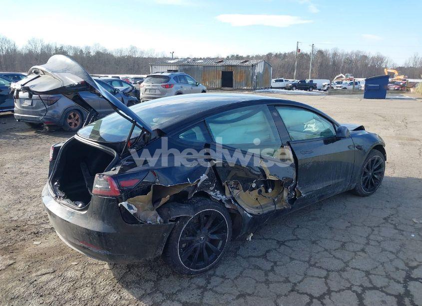 Photo 4 of 2021 Tesla Model 3 STANDARD RANGE PLUS REAR-WHEEL DRIVE (VIN 5YJ3E1EA3MF922064)