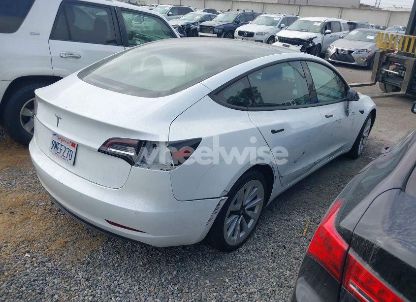Photo 4 of 2022 Tesla Model 3 REAR-WHEEL DRIVE (VIN 5YJ3E1EA3NF142759)