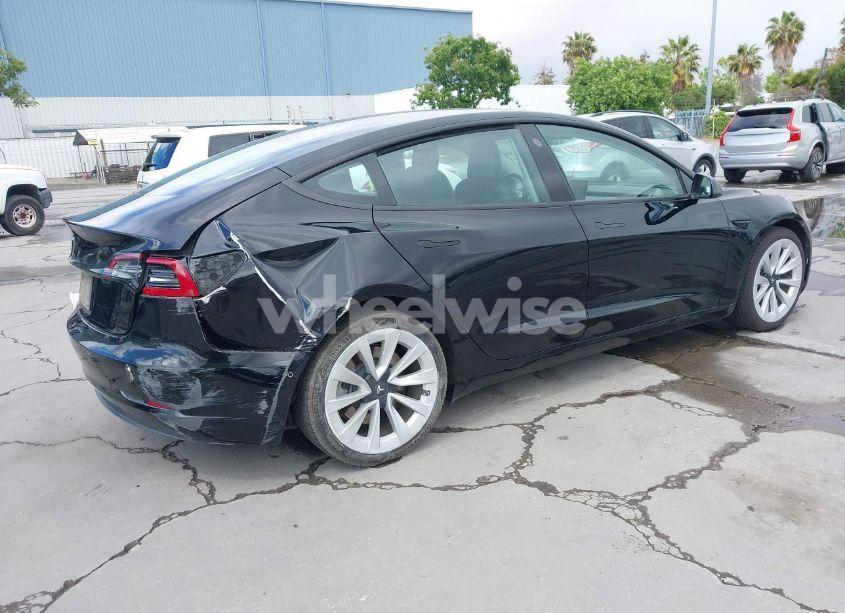 Photo 4 of 2022 Tesla Model 3 REAR-WHEEL DRIVE (VIN 5YJ3E1EA4NF302910)