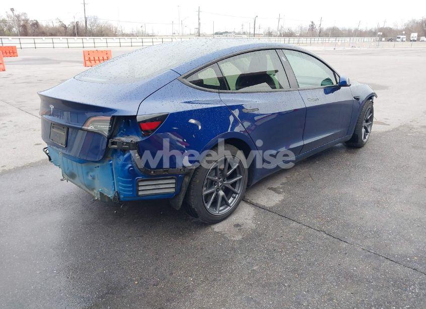 Photo 4 of 2021 Tesla Model 3 STANDARD RANGE PLUS REAR-WHEEL DRIVE (VIN 5YJ3E1EA5MF027613)