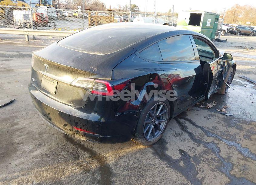 Photo 4 of 2021 Tesla Model 3 STANDARD RANGE PLUS REAR-WHEEL DRIVE (VIN 5YJ3E1EA5MF031614)