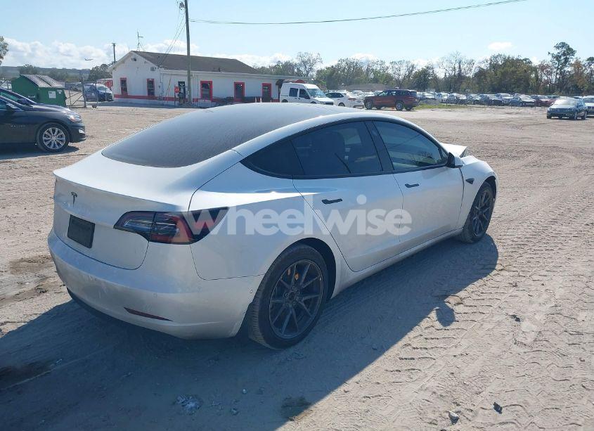 Photo 4 of 2021 Tesla Model 3 STANDARD RANGE PLUS REAR-WHEEL DRIVE (VIN 5YJ3E1EA5MF082417)