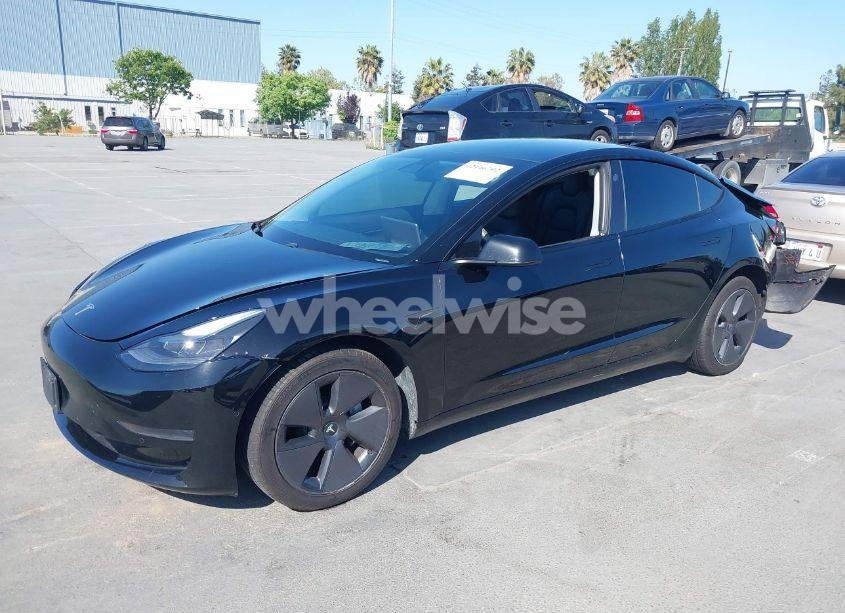Photo 2 of 2021 Tesla Model 3 STANDARD RANGE PLUS REAR-WHEEL DRIVE (VIN 5YJ3E1EA5MF939299)